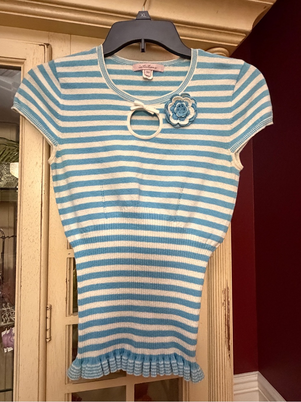 Striped Blue and White Knit Top with Flower Accent